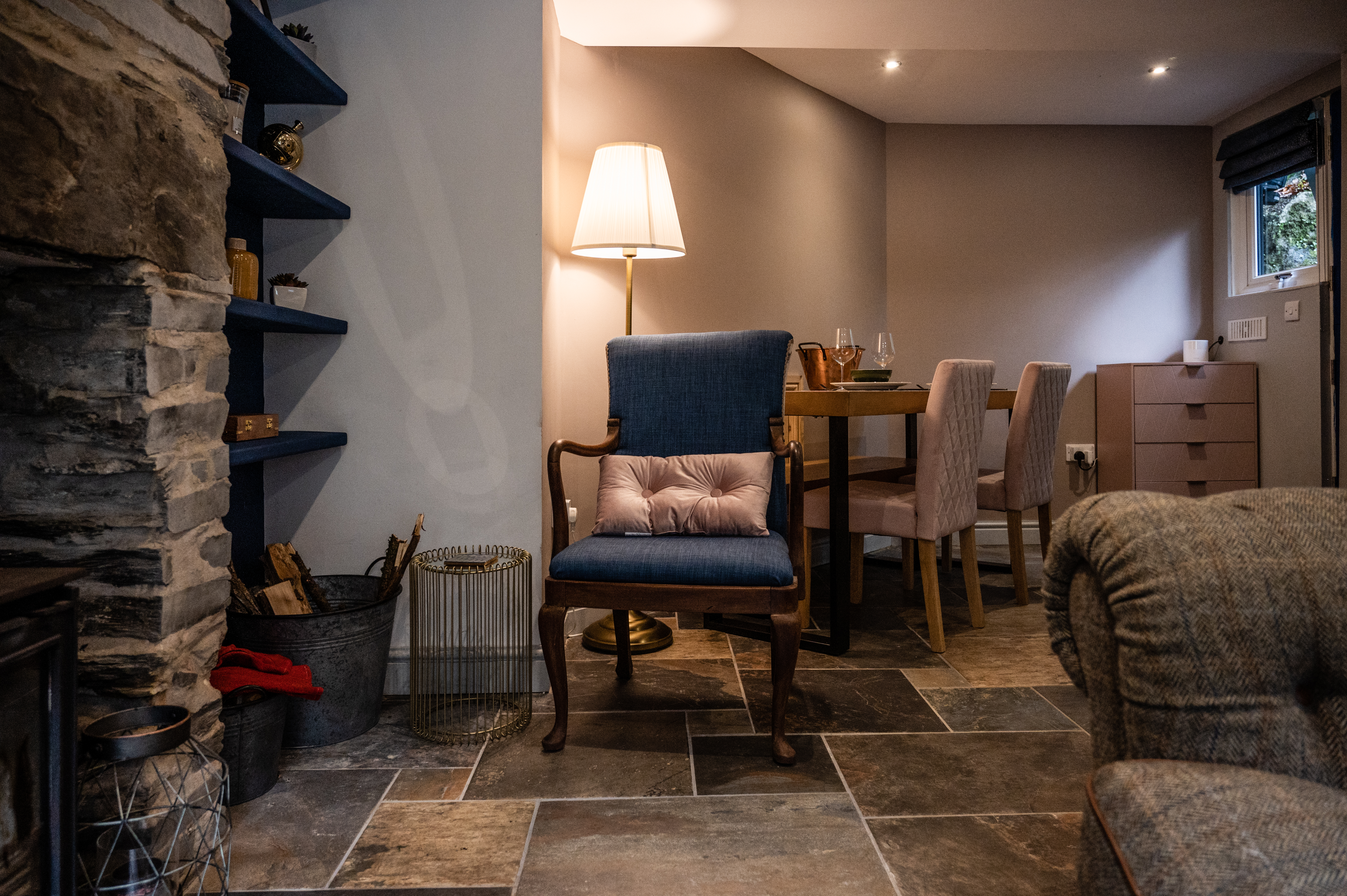 Dining area with table for four and ambient lighting