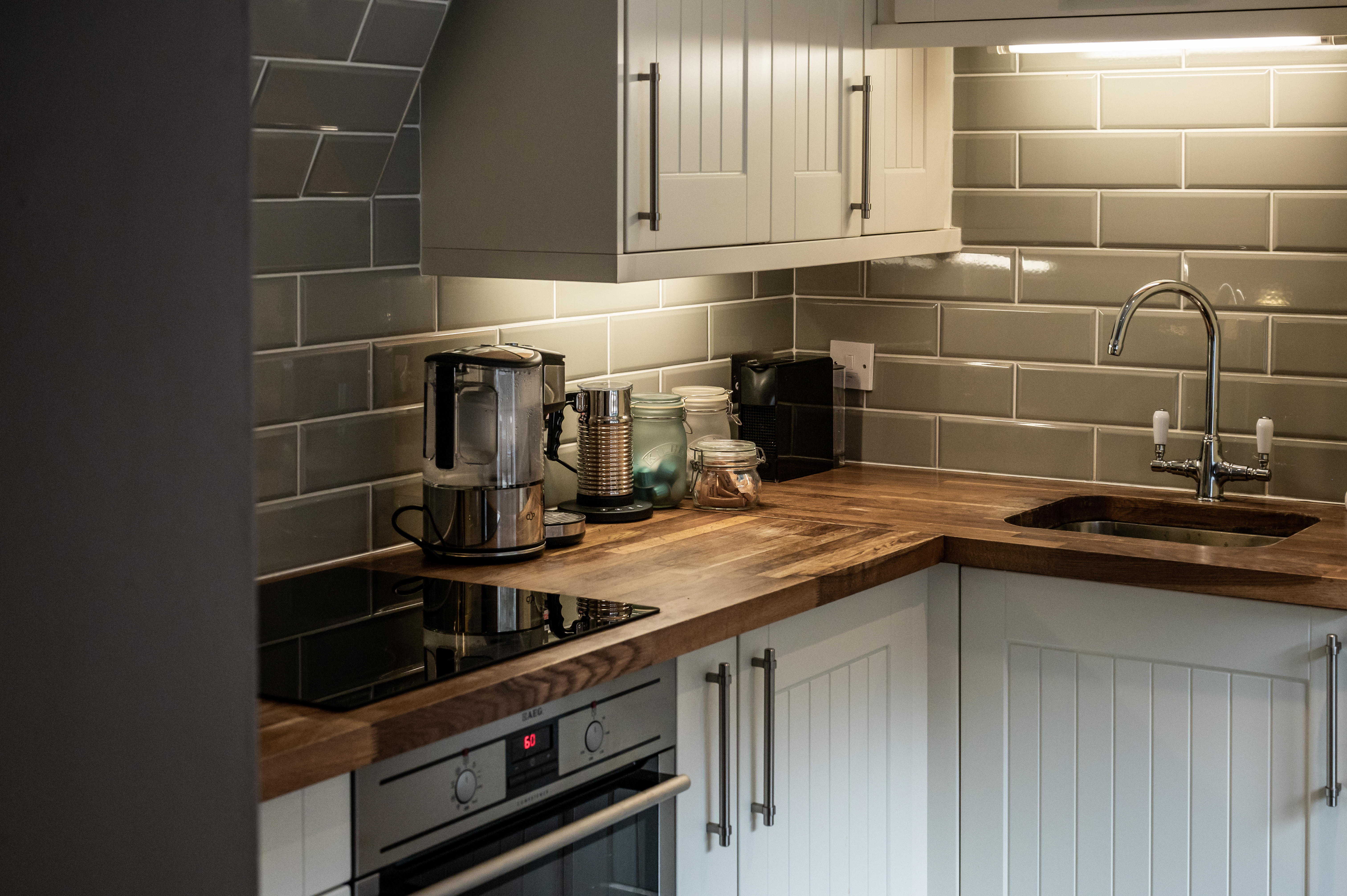 Kitchen with Nespresso machine and wooden worktops