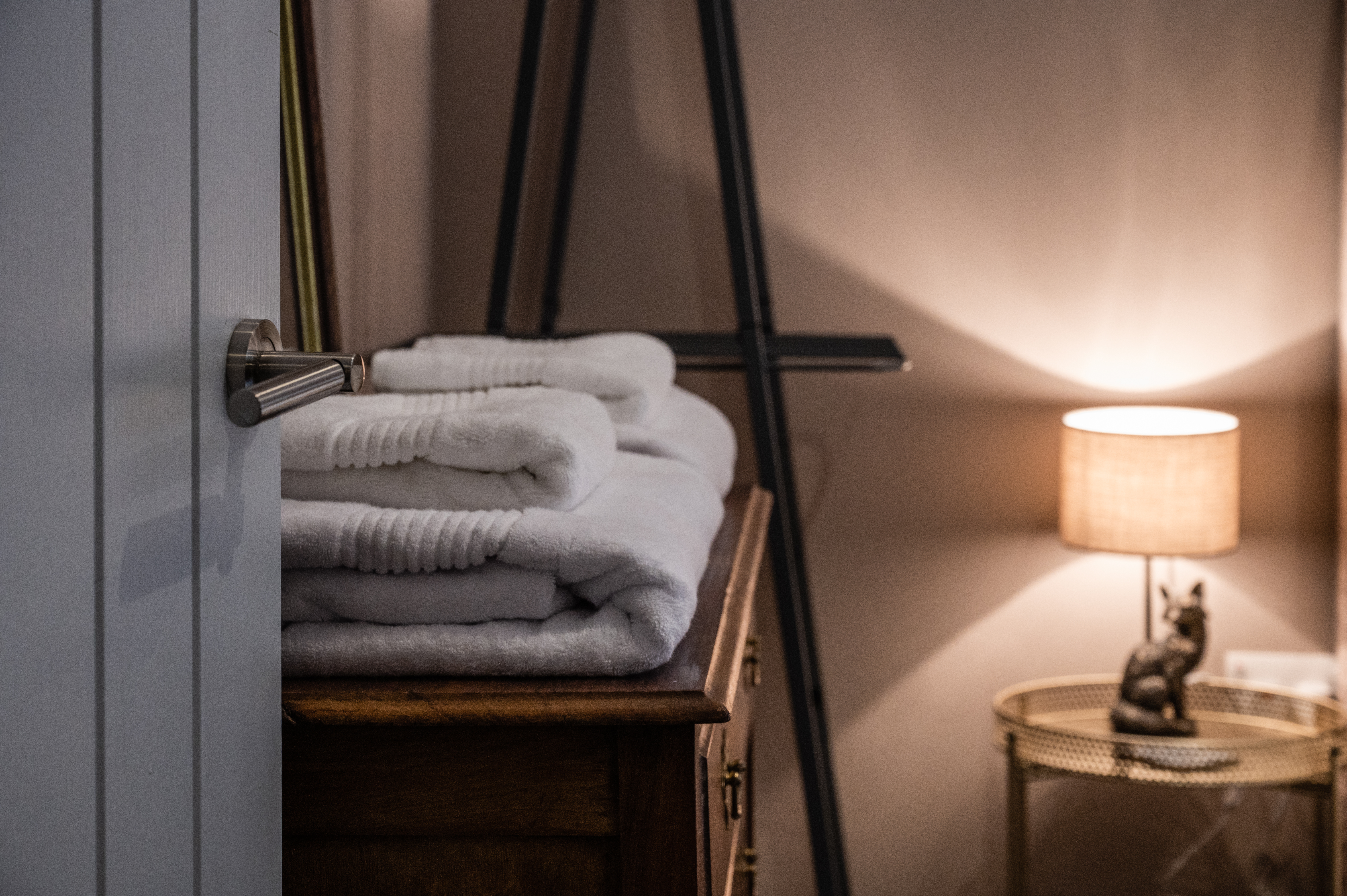 Fresh towels and thoughtful details in the bedroom